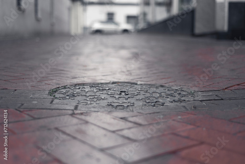 Street after the rain. Drain