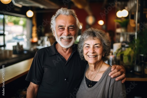 Portrait of a senior couple in their restaurant