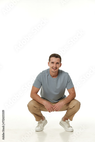 handsome young smiling man on white background