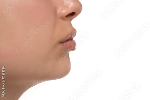 Closeup nose , mouth and cheek of a young woman on a white background