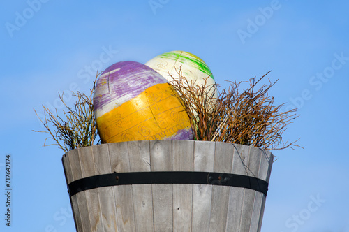 Easter decoration in the city of Riga with wooden eggs against the blue sky. Latvia