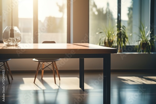 sunlit room with wooden table and chairs