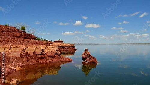 Timelapse video of Glendo Reservoir. Beautiful hot day in Glendo Wyoming. Reflection off the surface ripple as the wind blows on the water. This is as State Park in  North America in summer months. photo