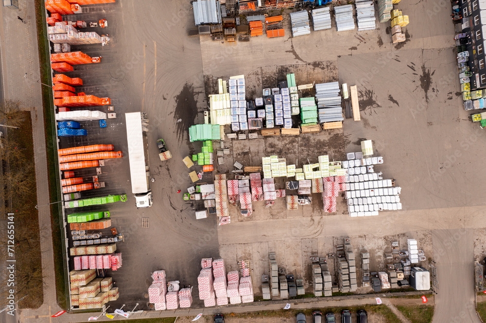 Drone photography of construction material outdoor shop during autumn day - obrazy, fototapety, plakaty 