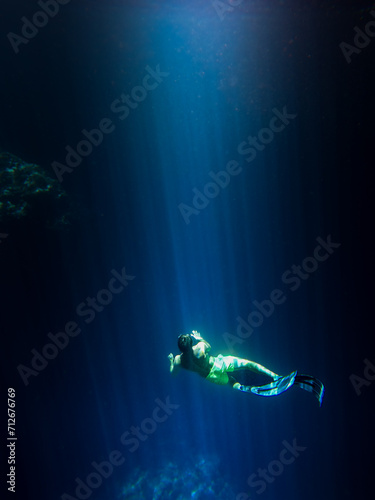 diving in a cave underwater 