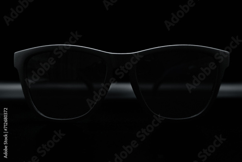 Black Sunglasses with dark background