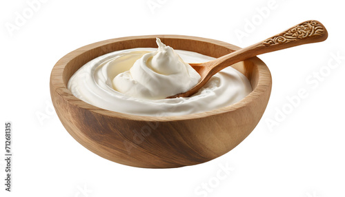 Sour cream in wooden bowl with spoon Sour cream in wooden bowl with spoon