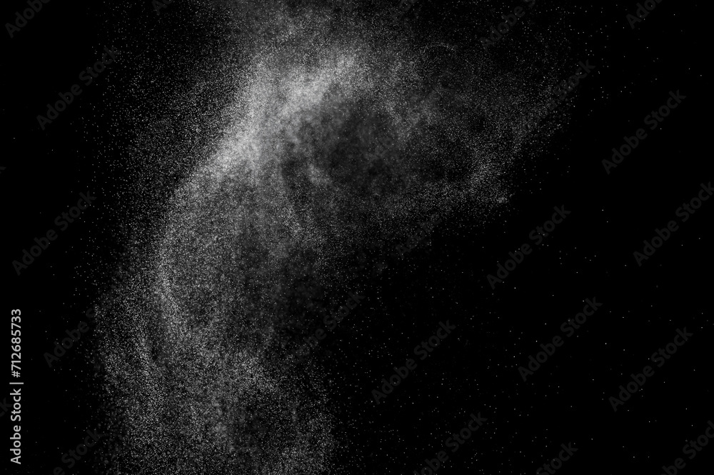 Abstract splashes of water on black background. White explosion. Light overlay texture.
Abstract splashes of water on black background. White explosion. Light overlay texture.