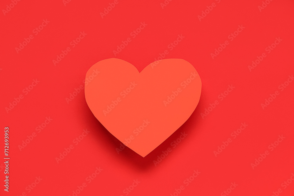 Paper heart on red background. Valentine's day celebration