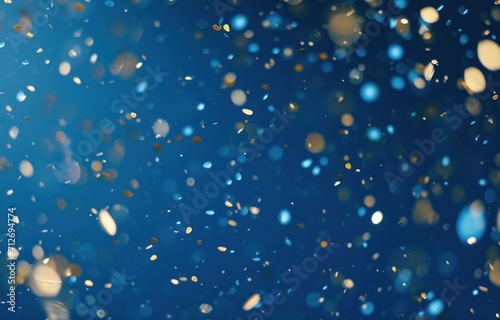 a blue background with blue, gold and silver glitter