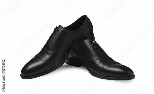 Pair of black leather men shoes isolated on white © New Africa