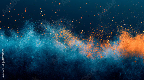 fondo de pantalla formada por pequeñas manchas o polvo de colores sobre un fondo azul photo