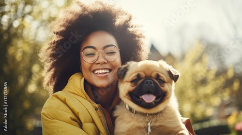 Happy black african american woman and dog in spring park photo