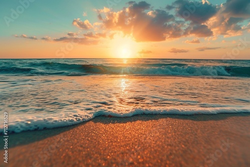 Closeup sea sand beach. Panoramic beach landscape. Inspire tropical beach seascape horizon. Orange and golden sunset sky calmness tranquil relaxing sunlight summer mood. Vacation travel holiday banner © Alizeh