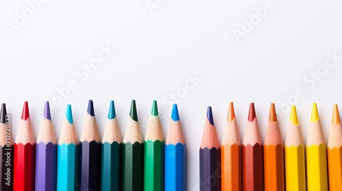 Vibrant set of colored pencils with white outer coating on a clean white background