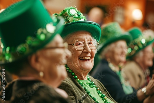 Group of happy senior friends celebrating St Patrick's Day. Elderly people wearing green hats and shamrock necklaces. Celebration, holiday, and friendship concept © dreamdes