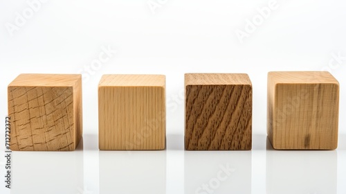 Arrangement of small wooden blocks on white background for text placement and copy space