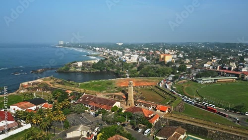 Aerial view of Galle, Sri Lanka, showcasing the historic fort, cricket stadium, coast and urban landscape with verdant tropical fauna, a blend of heritage and modernity. photo