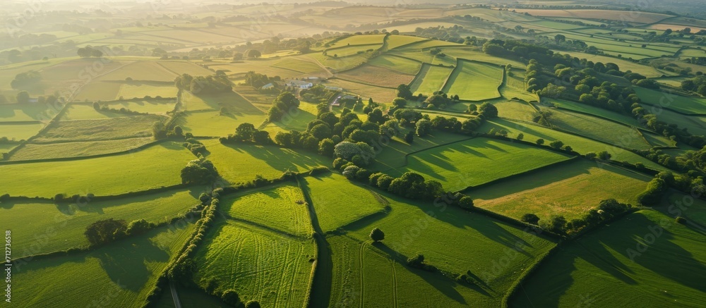 Aerial view of Somerset, England's rural landscape. - obrazy, fototapety, plakaty 