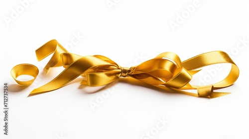 Shiny curly gold ribbon for christmas and birthday present banner isolated on white background