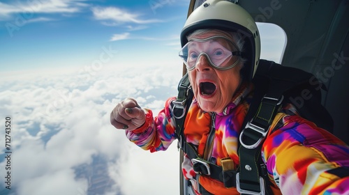 Exhilarating moment of a senior woman skydiving, with a backdrop of expansive blue skies
