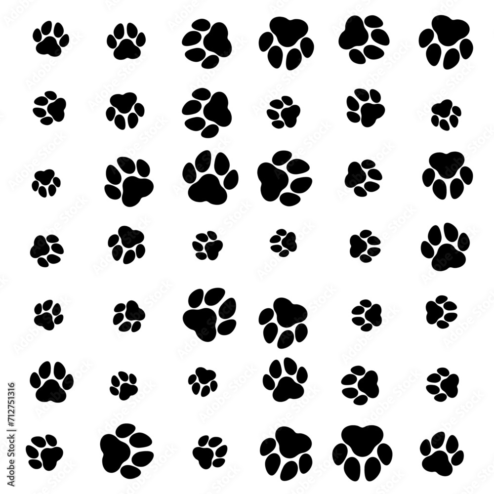 Fototapeta premium ramdon paw pattern sizes on white background