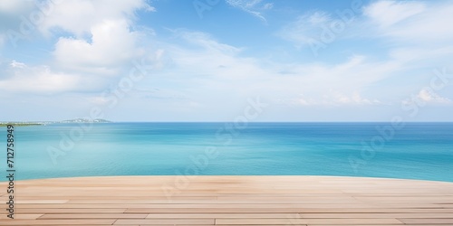 Empty table for displaying products with a scenic view of the sea and vibrant sky.