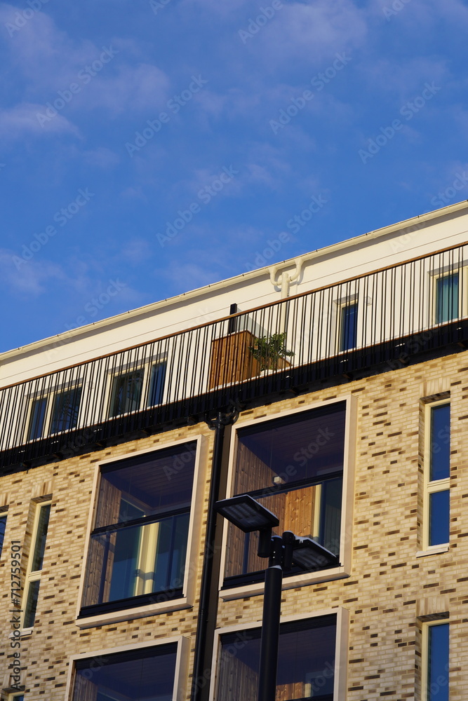 Close up of new modern building in Noblessner district. Blue sky on the back. Tallinn, Estonia, Europe. January 2024.