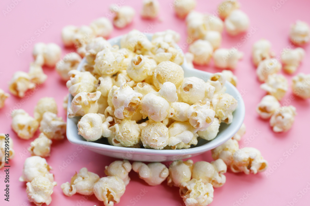 Sweet popcorn on pink background. Sweet popcorn on pink background.