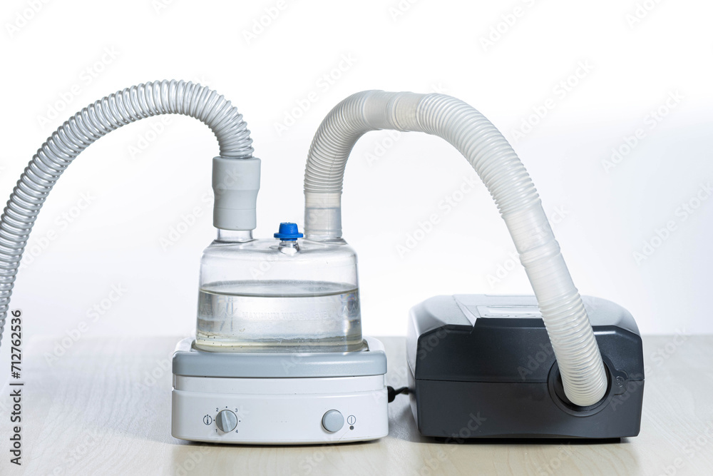 complete cepap set with air humidifier. horizontal with white background complete cepap set with air humidifier. horizontal with white background