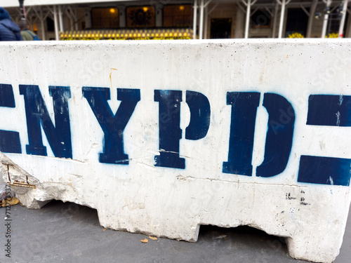 NYPD concrete road block on the sidewalk