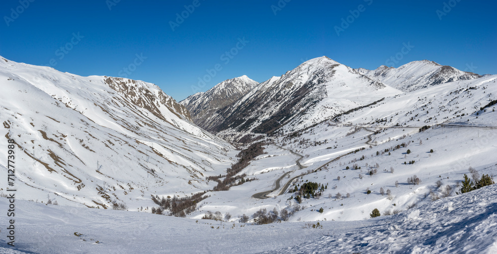 Winding Through Winter: Snowy Mountain Pass