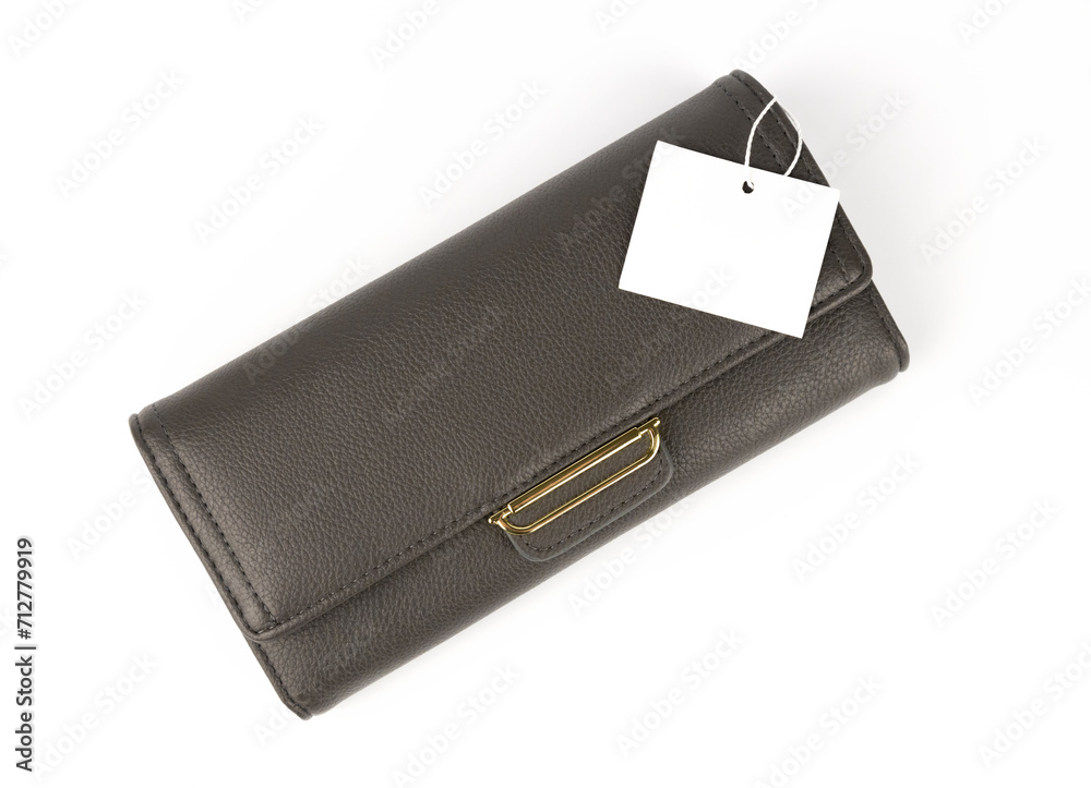 Gray women's wallet. New leather clutch for women with a price tag, women's handbag. The concept of fashion and beauty. Gray women's wallet. New leather clutch for women with a price tag, women's handbag. The concept of fashion and beauty.