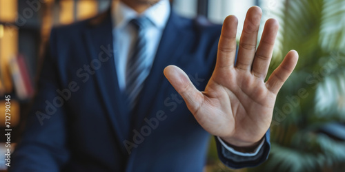 close up of the hand of a business man showing stop, generative AI