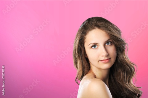 Photo of nice lady posing on bright pink background