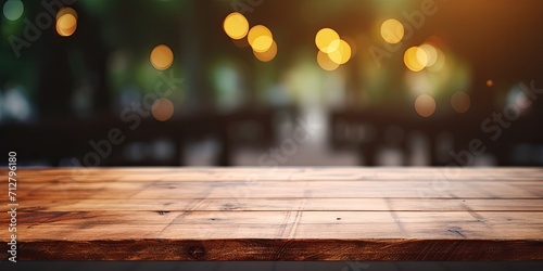 Blurry abstract background with empty wooden table.