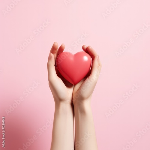 Love concept. heart in hands on a pink background. Valentines day concept. world heart day Generative AI.