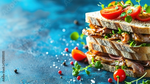 Tasty sandwiches with canned smoked sprats on blue background
