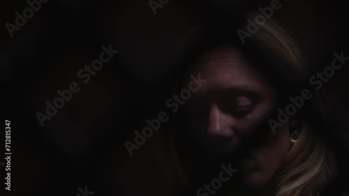 Woman in a Confessional in church photo