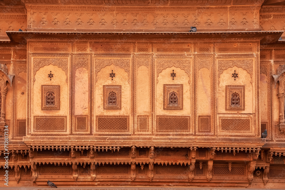 Fototapeta premium Heritage building in Rajasthan, India made of yellow limestone known as the Patwon ki Haveli in Jaisalmer city in India