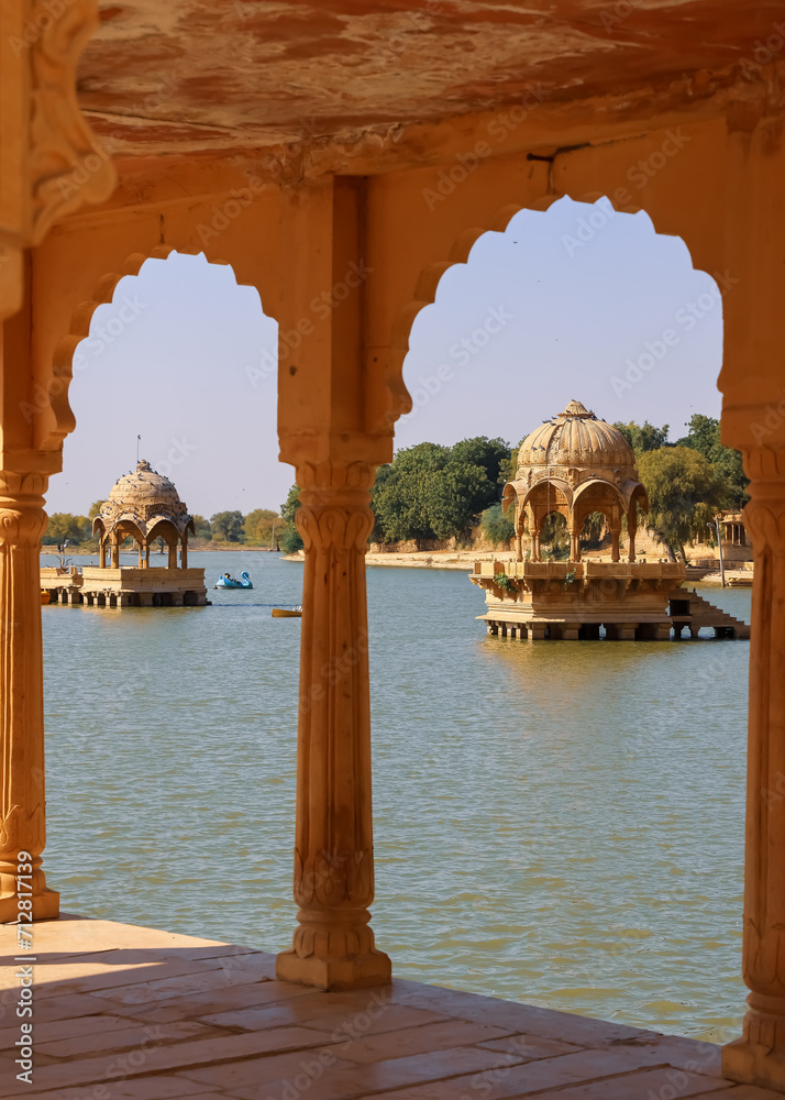 Artistically carved sandstone pavilions at the Lake Gadisar in Jaisalmer, Rajasthan.