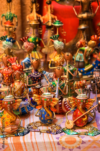 Colorful Rajasthani style handicrafts up for sale in the market at Jaisalmer, Rajasthan, India.