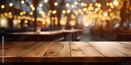 Perfect wooden table in a cafe with a blurred background and bokeh effect.