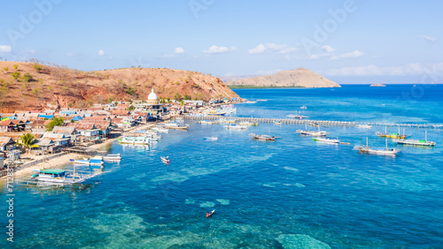 Aerial view of fishing village called Papagarang in Komodo National Part, East Nusa Tenggara, Flores, Indonesia.