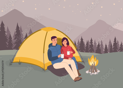 Smiling Couple In Puffer Vest Sitting In Front Of Tent Drinking Coffee Together. Full Length.
