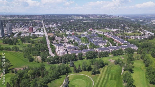 Shaganappi Point Golf Course and the Spruce Grove neighbourhood in Calgary Alberta Canada viewed from an overhead aerial drone. photo