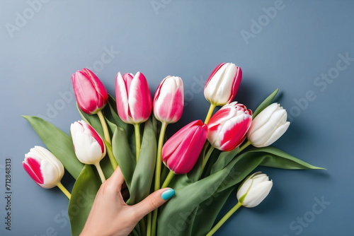 Tulips bunch flatlay Spring petal top view Happy mothers day. 8 march mom s bouquet. Flowers background. Above fresh leaf. Bright floral gift Art colorful love card frame. Copy space Flat lay on table © raisondtre