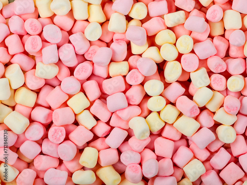 many colorful marshmallows background. top view.