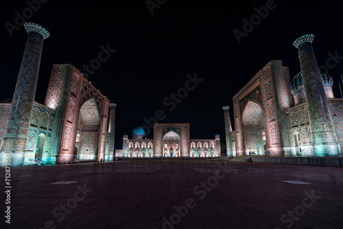 Registan Square at Night with Stars, an old public square with starry sky in the heart of the ancient city of Samarkand, Uzbekistan. photo