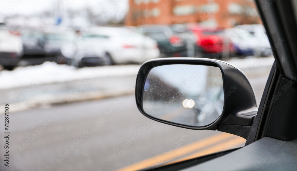 car mirror reflecting past, present, and future, symbolizing the journey of life and the pursuit of dreams